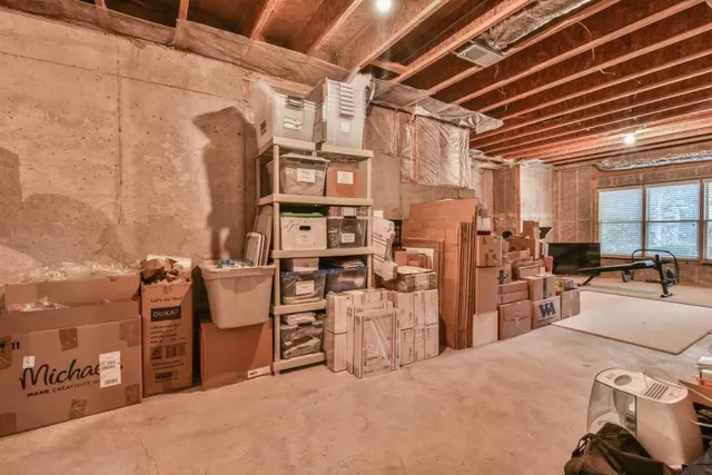 a view of a house with a yard and plants
