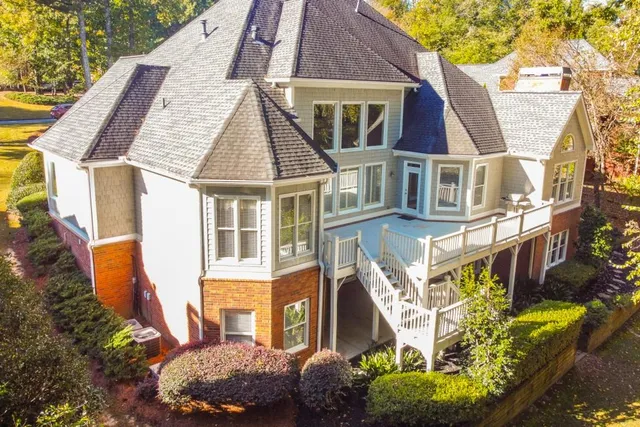 a view of swimming pool with an outdoor space and seating area