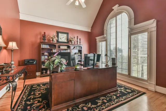 a living room with furniture and a rug