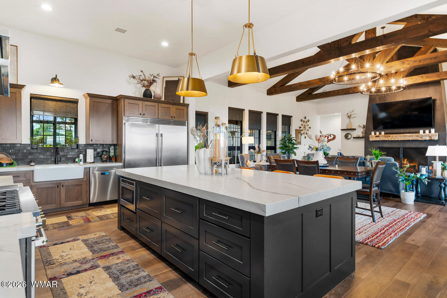512 Fieldy Road Show Low, AZ 85901 - Photo 26 of 128 a kitchen with stainless steel appliances granite countertop a sink a stove and a wooden floors