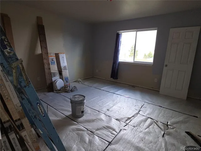 a view of two chairs in a room