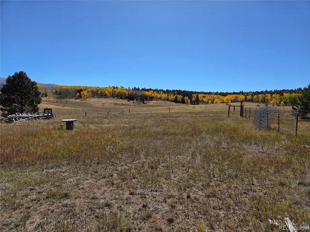 a view of an ocean with city and mountain view