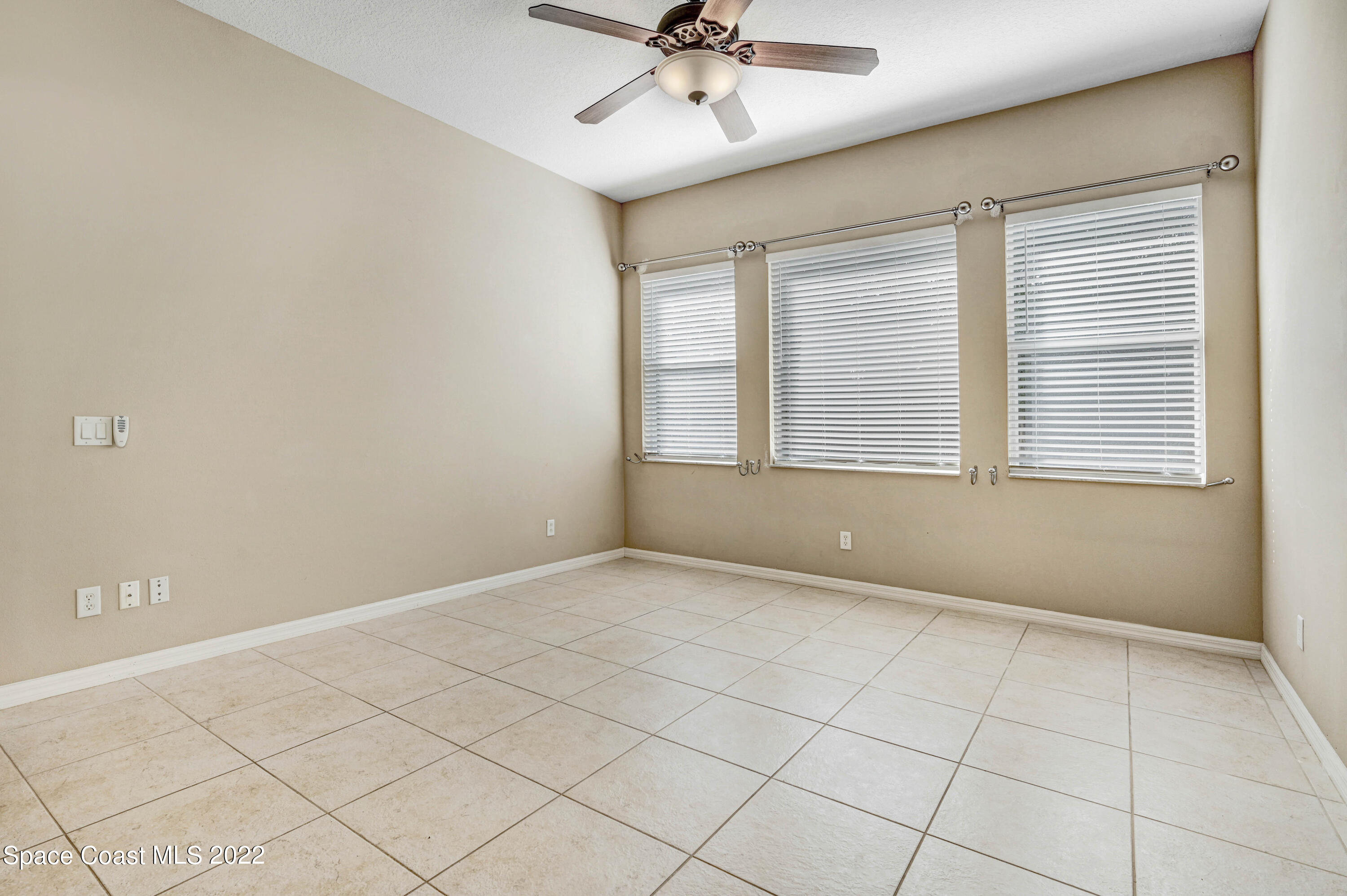 2077 Elkins Point Melbourne, FL 32935 - Photo 14 of 31 a view of an empty room with a window