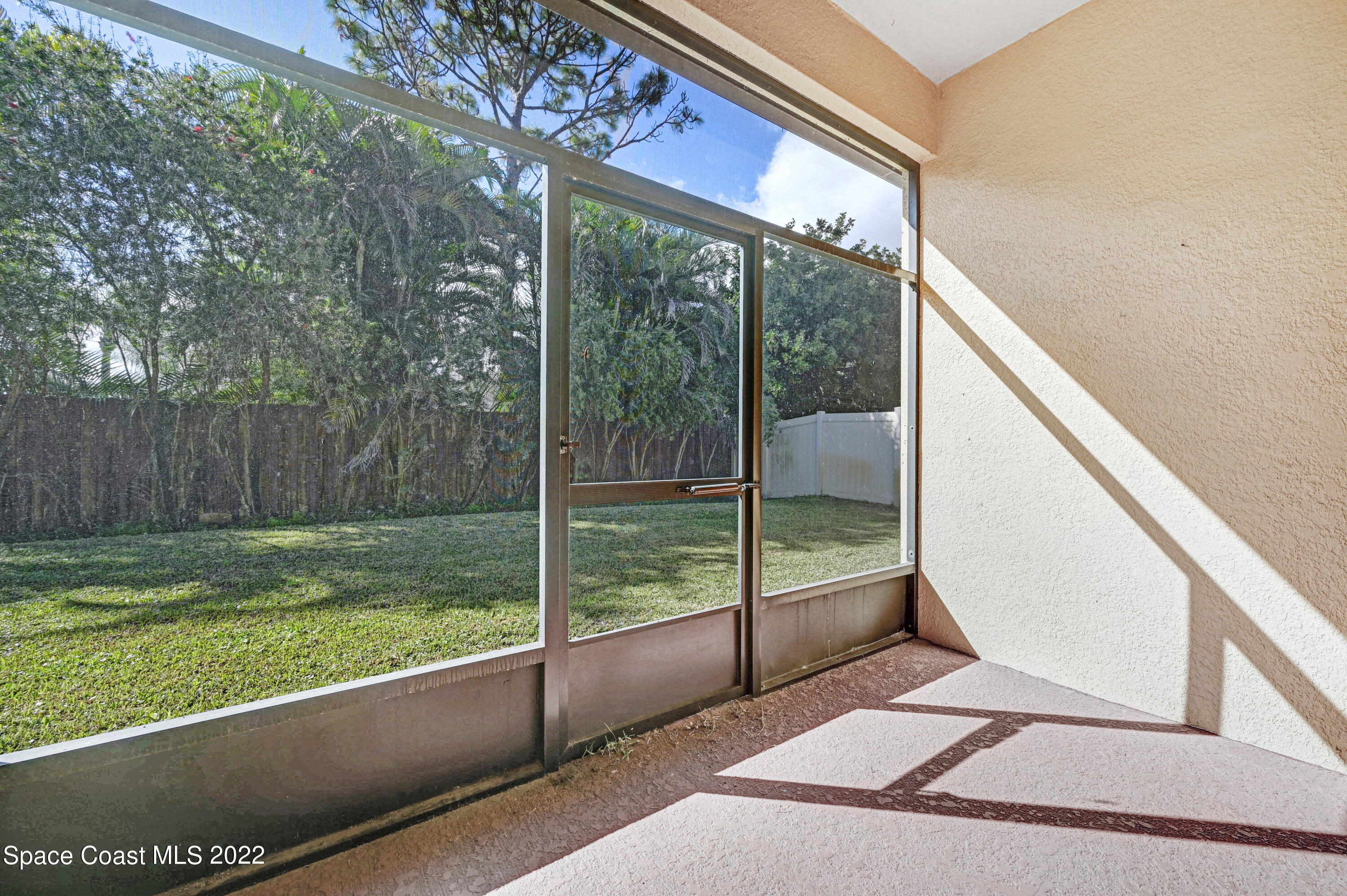 2077 Elkins Point Melbourne, FL 32935 - Photo 26 of 31 a view of a porch and garden