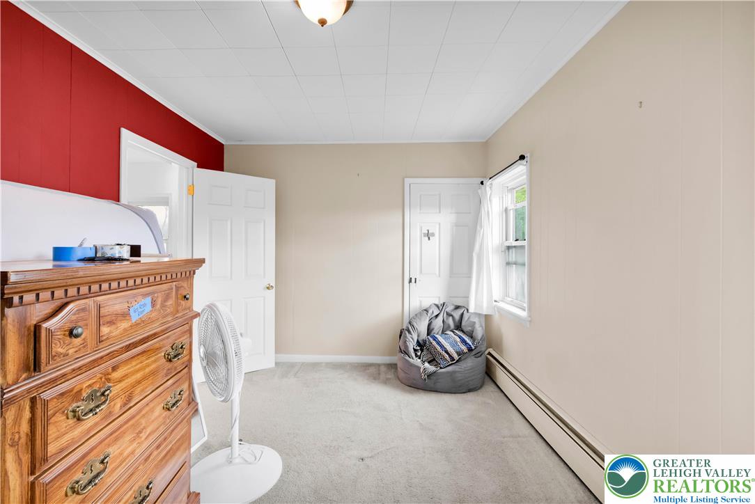 7281 Decatur Street New Tripoli, PA 18066 - Photo 16 of 24 a view of a room with rack and wooden floor
