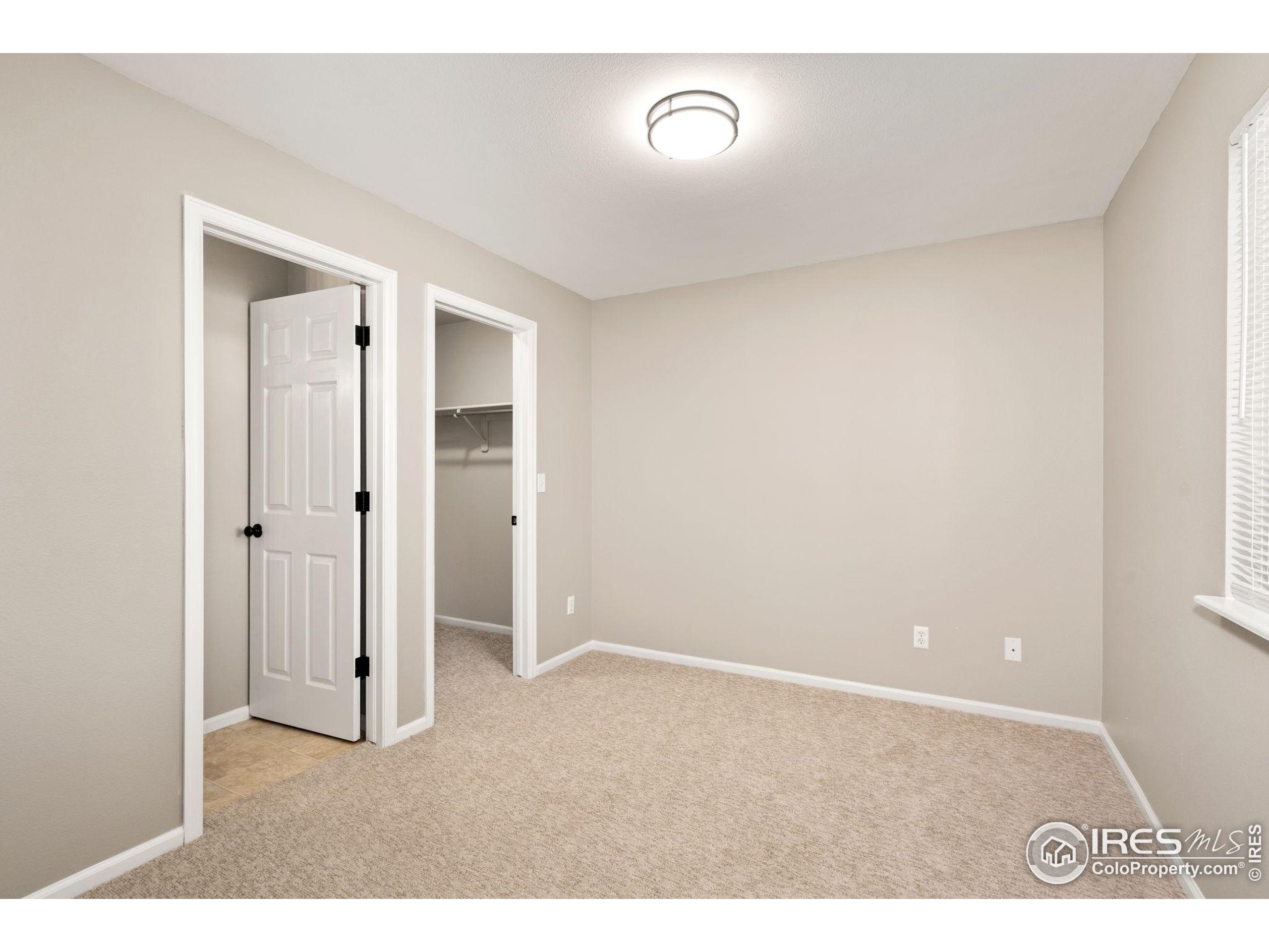 1021 Rolland Moore Drive, Unit F Fort Collins, CO 80526 - Photo 15 of 29 a view of an empty room