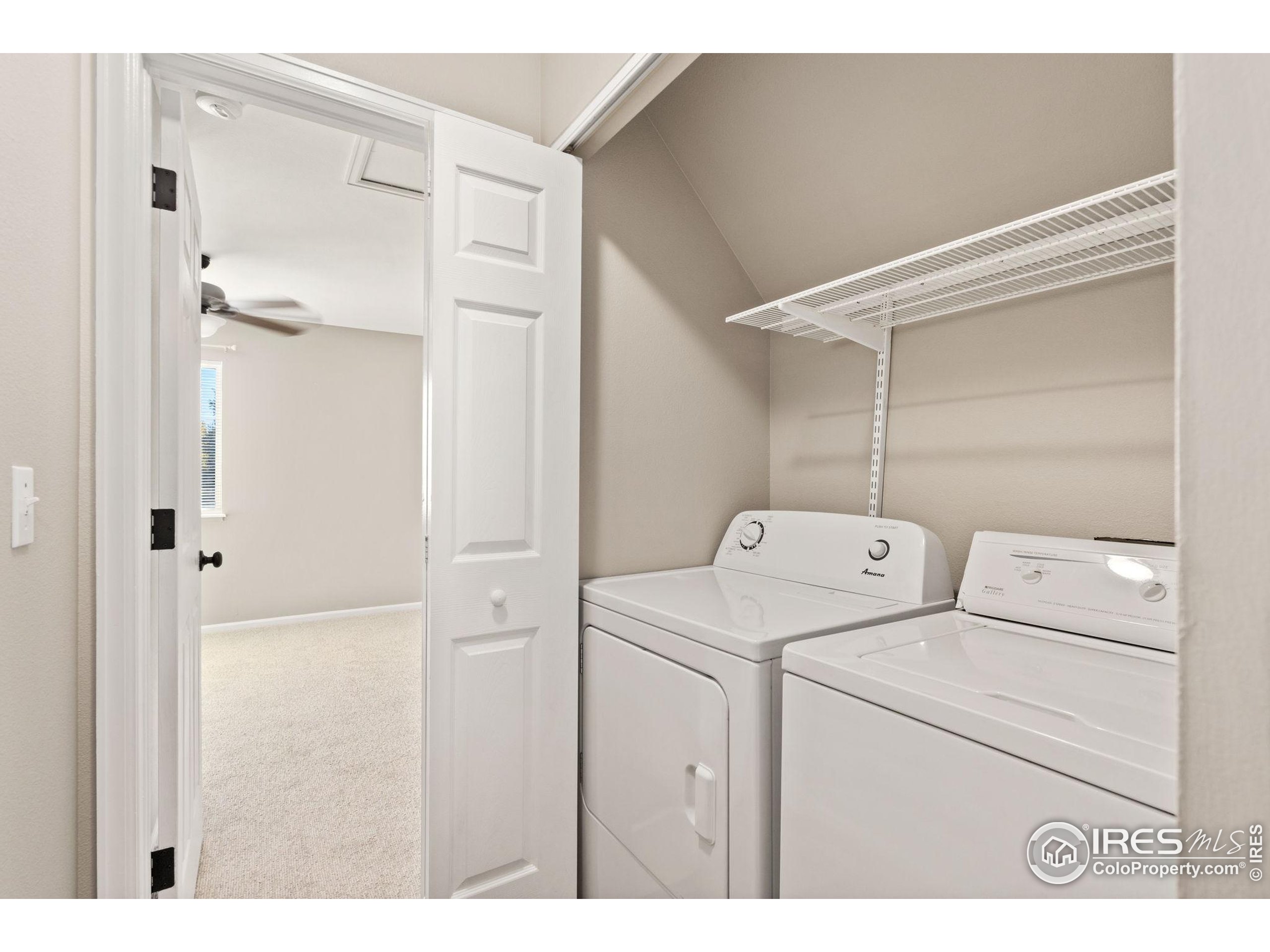 1021 Rolland Moore Drive, Unit F Fort Collins, CO 80526 - Photo 20 of 29 a utility room with dryer and washer