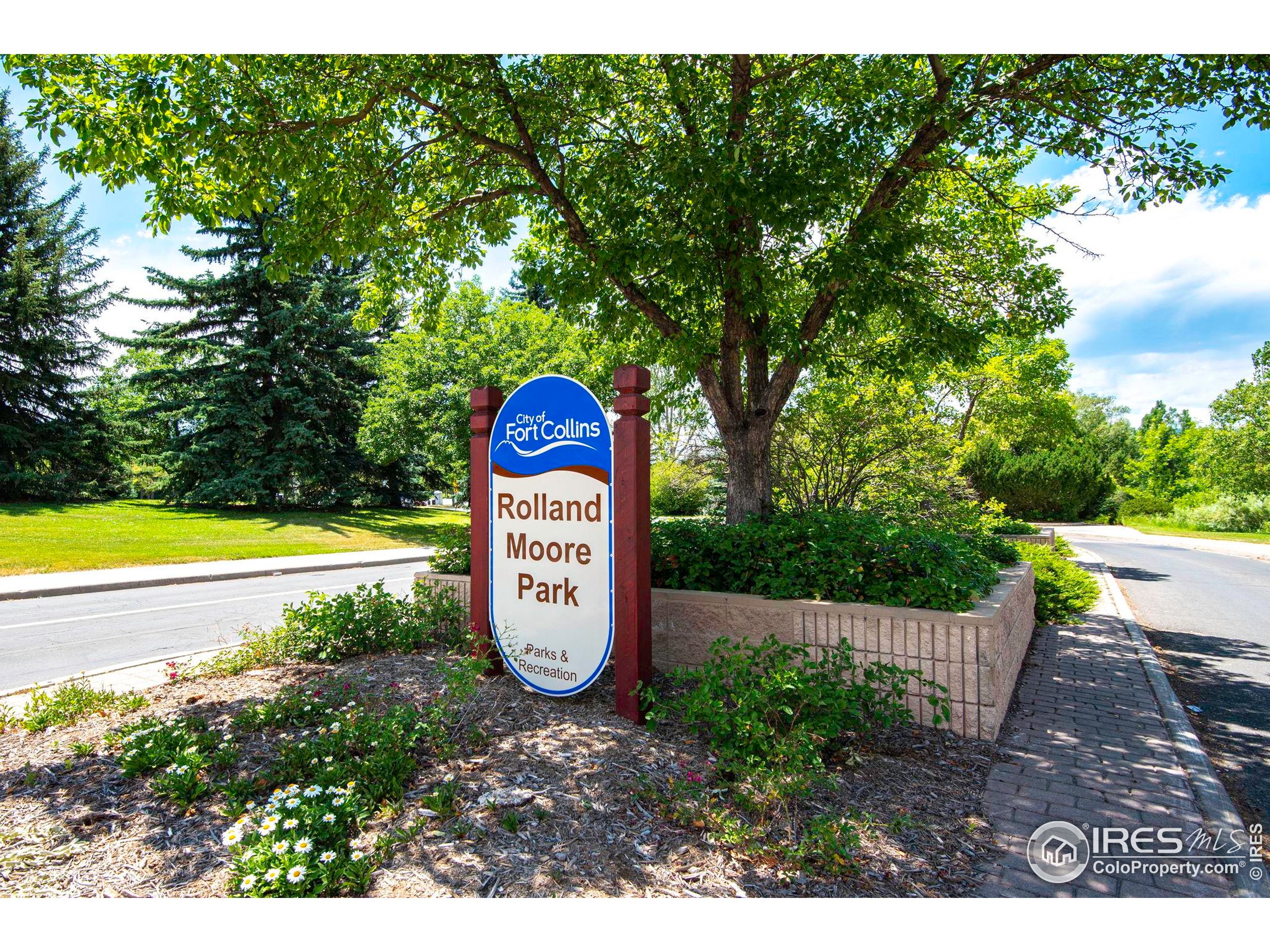 1021 Rolland Moore Drive, Unit F Fort Collins, CO 80526 - Photo 22 of 29 a view of outdoor space with a garden