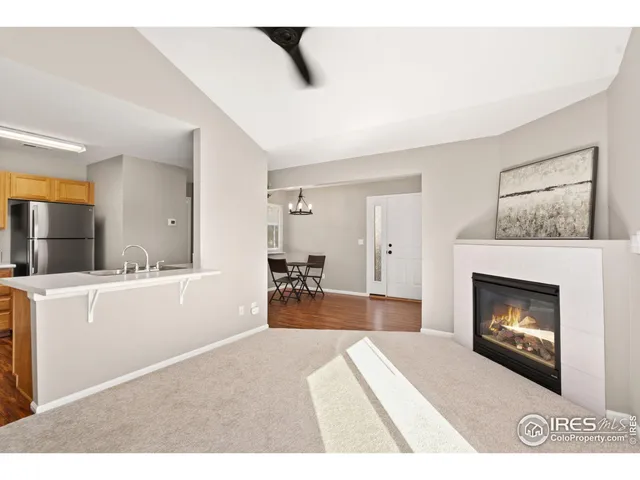 a kitchen with a sink appliances and cabinets