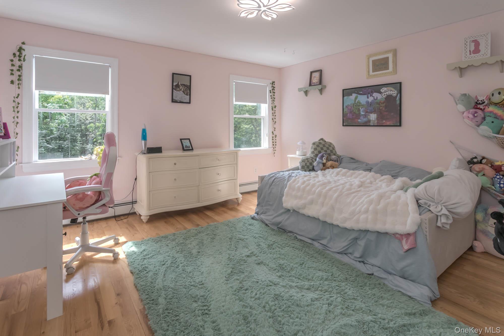 102 Beverly Road Chester, NY 10918 - Photo 35 of 49 a bed room with a bed and a window