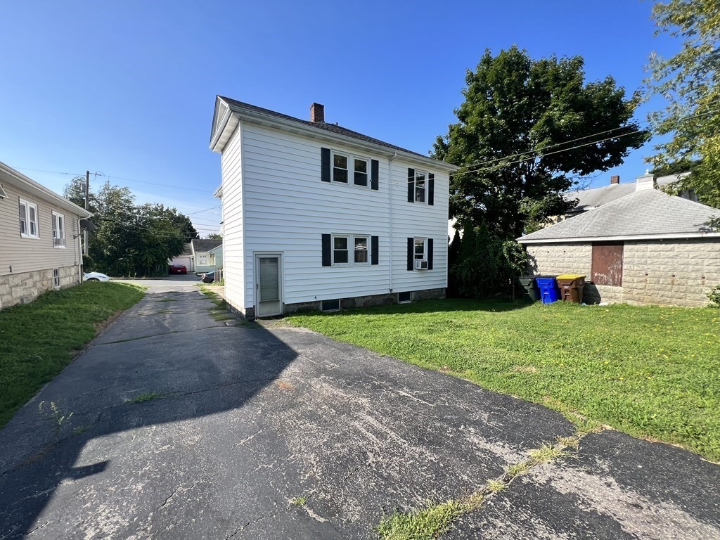 1590 Slade Street Fall River, MA 02721 - Photo 8 of 35 a view of a house with a yard