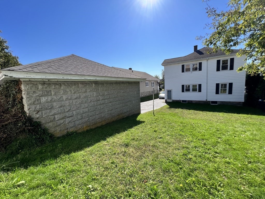 1590 Slade Street Fall River, MA 02721 - Photo 9 of 35 a view of a house with a garden