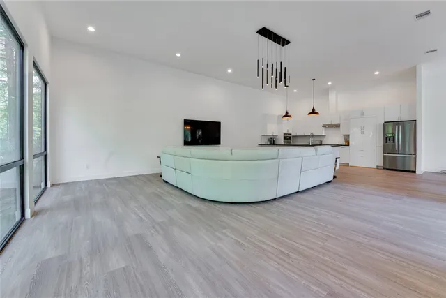 a living room with furniture and a table