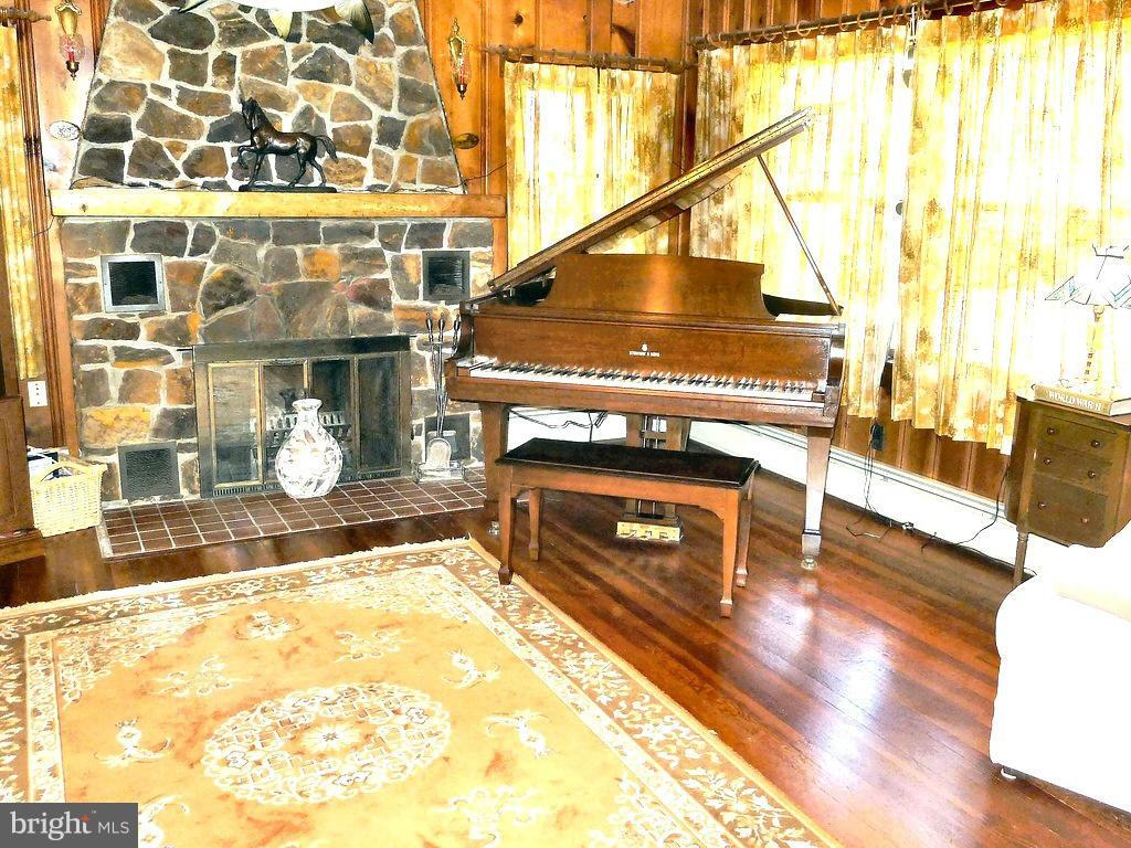 2465 Althea Road Port Republic, MD 20676 - Photo 2 of 4 a living room with a patio