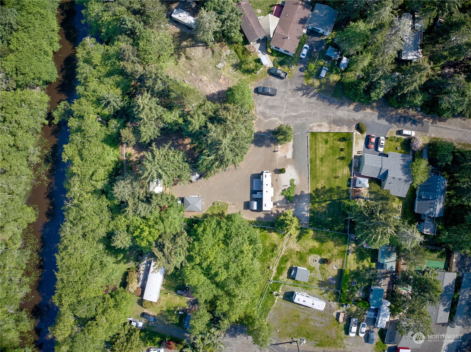 1413 321st Place Ocean Park, WA 98640 - Photo 18 of 20 an aerial view of a house with a yard
