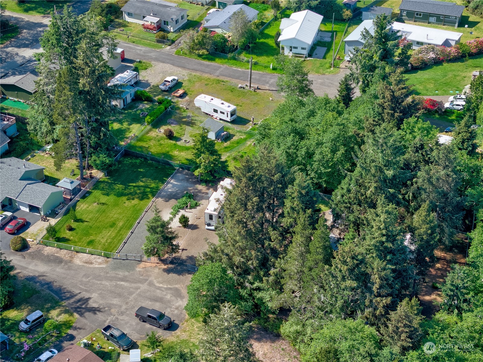 1413 321st Place Ocean Park, WA 98640 - Photo 3 of 20 a view of a garden with plants