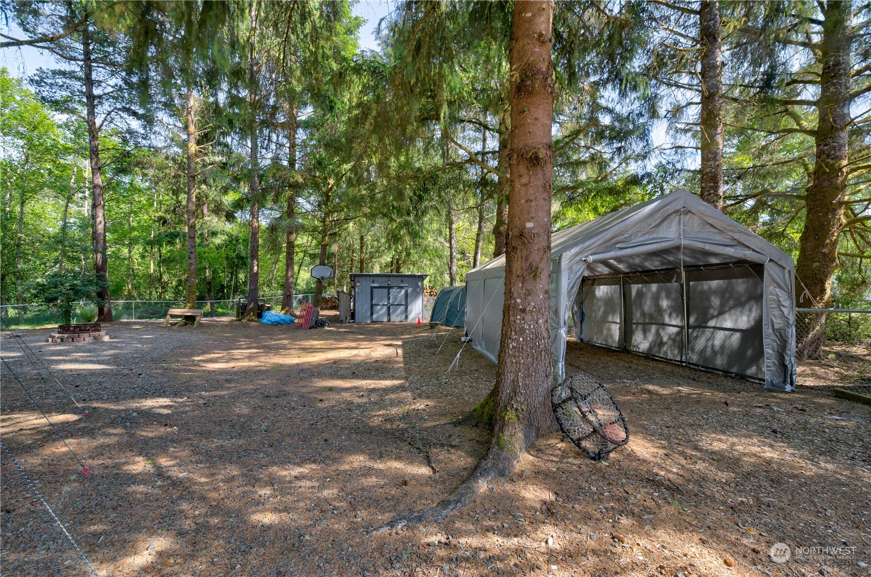 1413 321st Place Ocean Park, WA 98640 - Photo 6 of 20 a view of a house with yard and garage