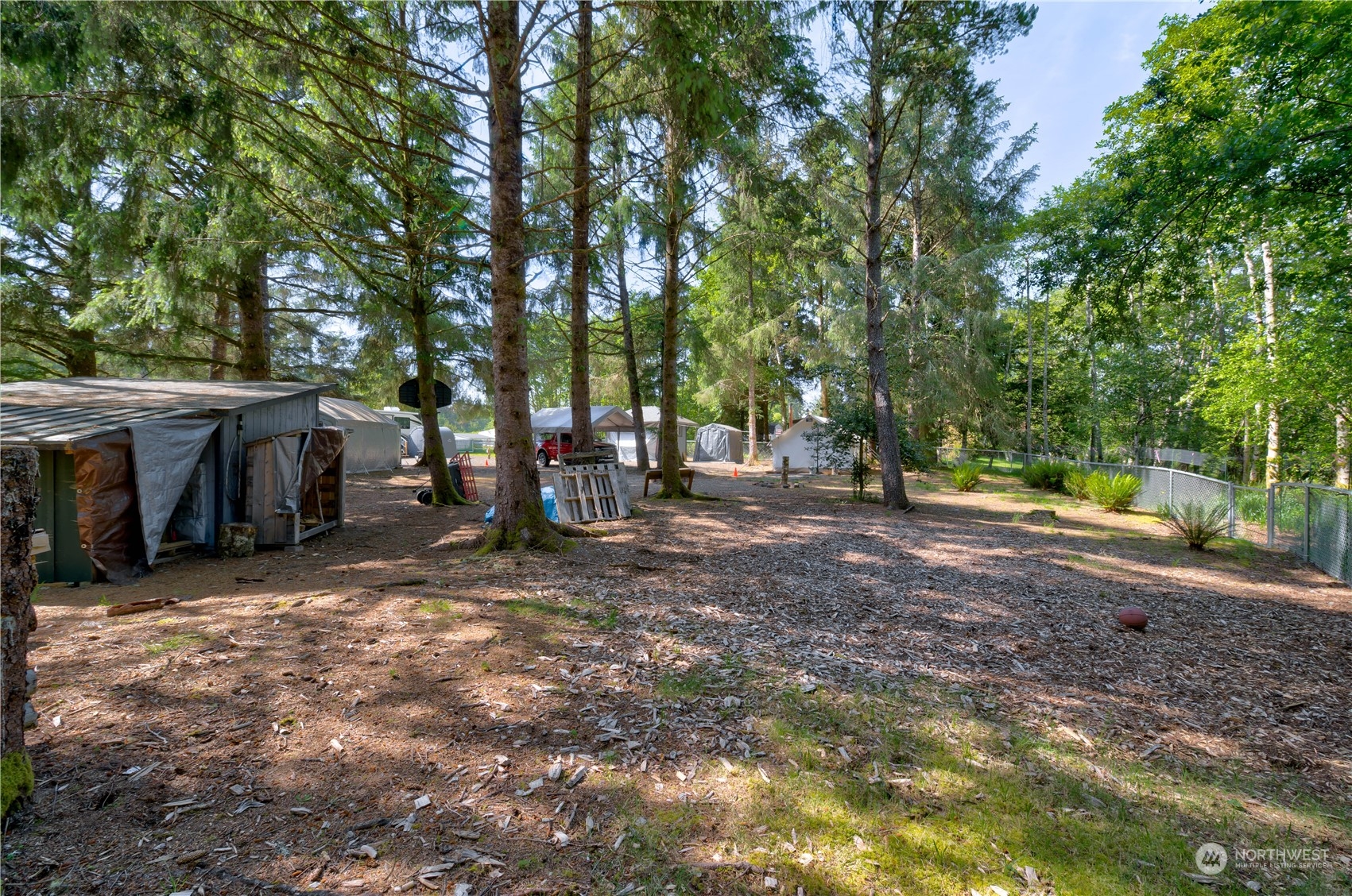 1413 321st Place Ocean Park, WA 98640 - Photo 8 of 20 a view of outdoor space with trees
