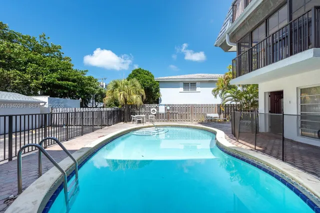 a view of a house with swimming pool