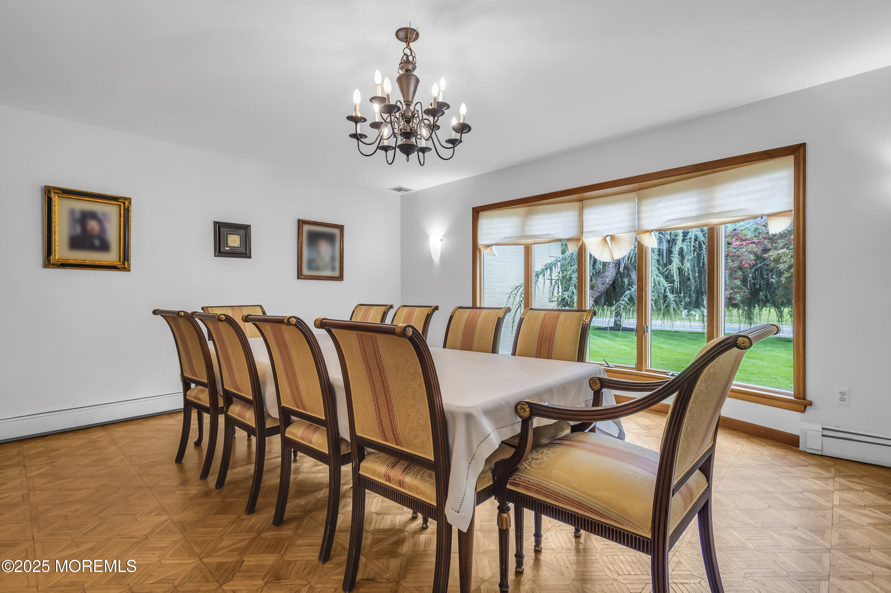 1350 Church Road Toms River, NJ 08755 - Photo 15 of 42 a dining room with furniture a large window and a chandelier