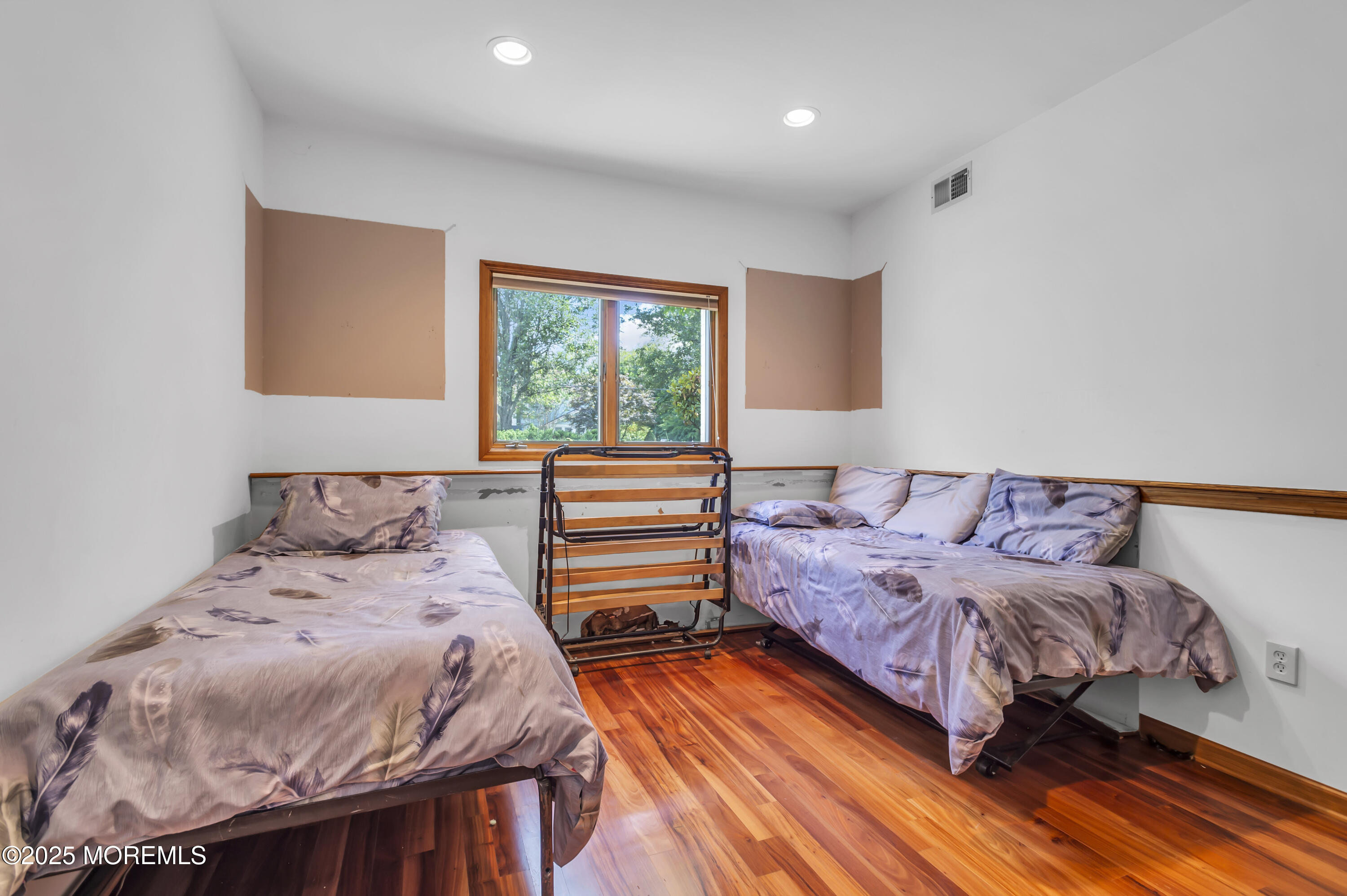 1350 Church Road Toms River, NJ 08755 - Photo 29 of 42 a bedroom with a bed and a night stand