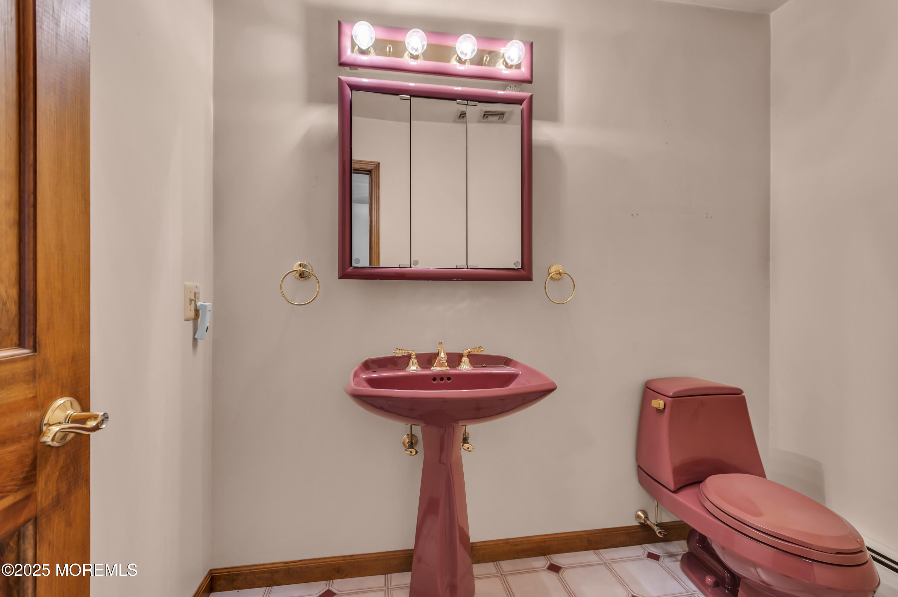1350 Church Road Toms River, NJ 08755 - Photo 32 of 42 a bathroom with a sink a toilet and mirror