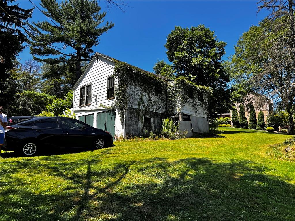 5650 Aiken Road McKees Rocks, PA 15136 - Photo 12 of 16 a view of a house with a yard