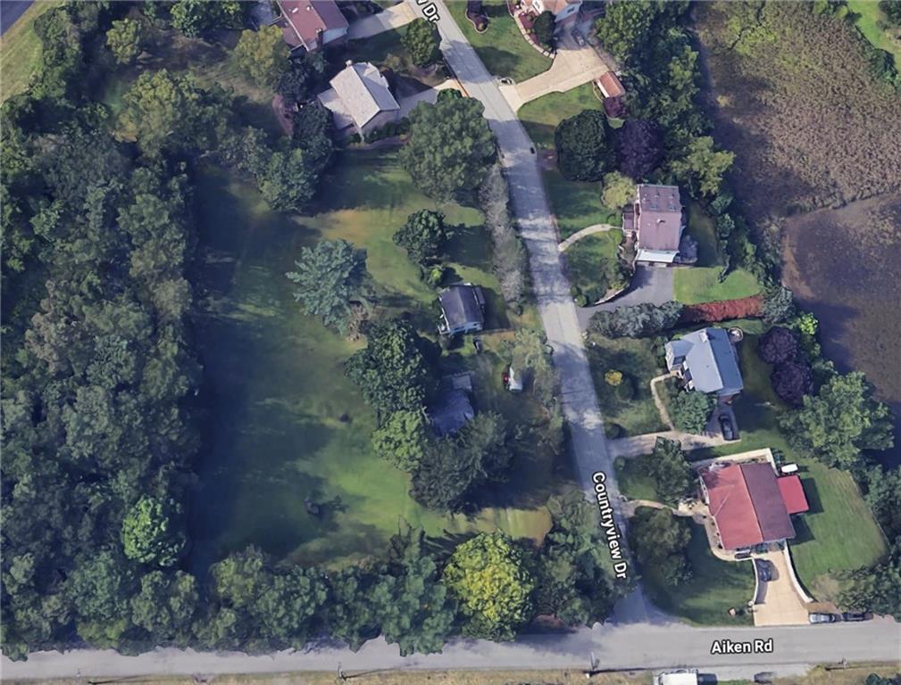 5650 Aiken Road McKees Rocks, PA 15136 - Photo 15 of 16 an aerial view of waterside residential houses with outdoor space