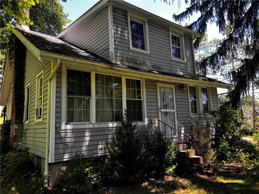 5650 Aiken Road McKees Rocks, PA 15136 - Photo 9 of 16 a front view of a house with a garden
