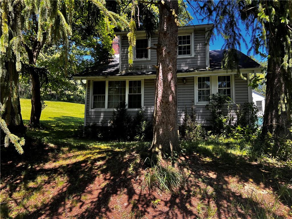 5650 Aiken Road McKees Rocks, PA 15136 - Photo 10 of 16 front view of a house with a yard