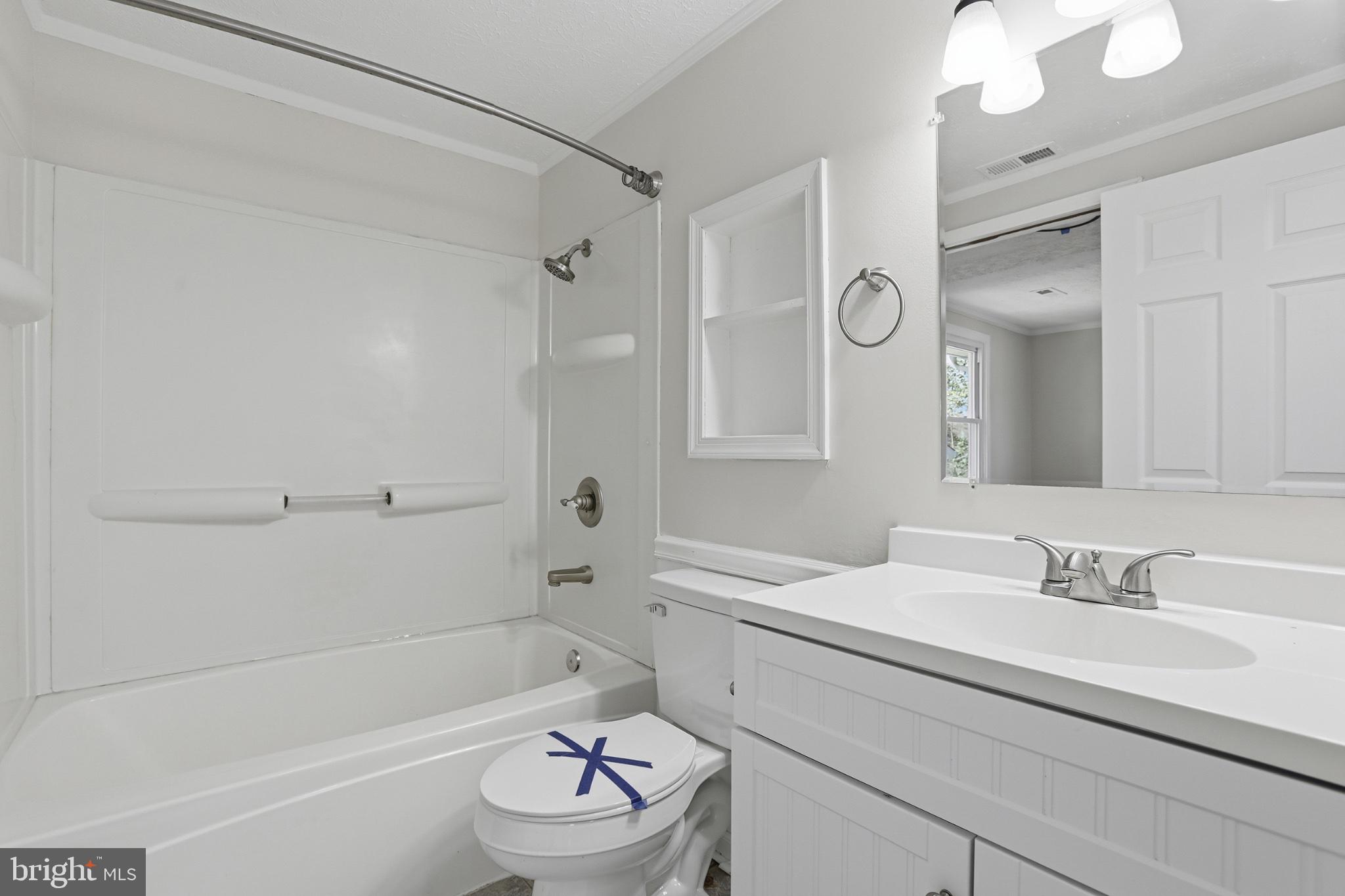 7012 Stanley Road King George, VA 22485 - Photo 21 of 37 Bright and airy bathroom retreat.