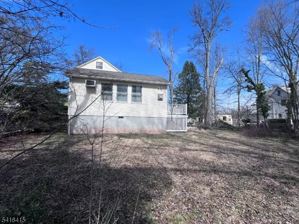 a view of backyard with green space