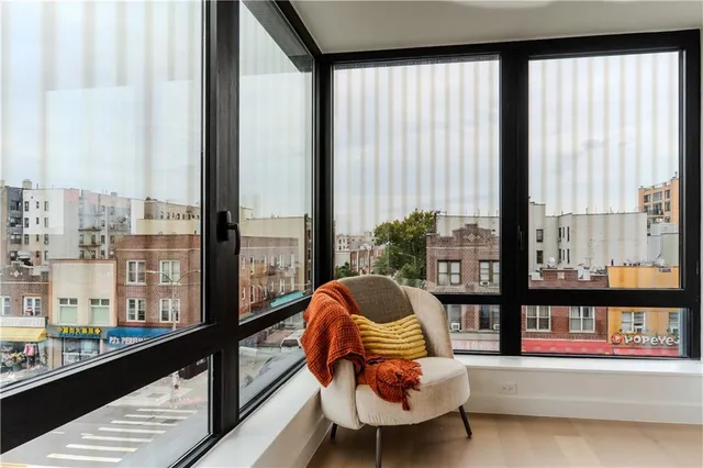 a room with furniture and a window