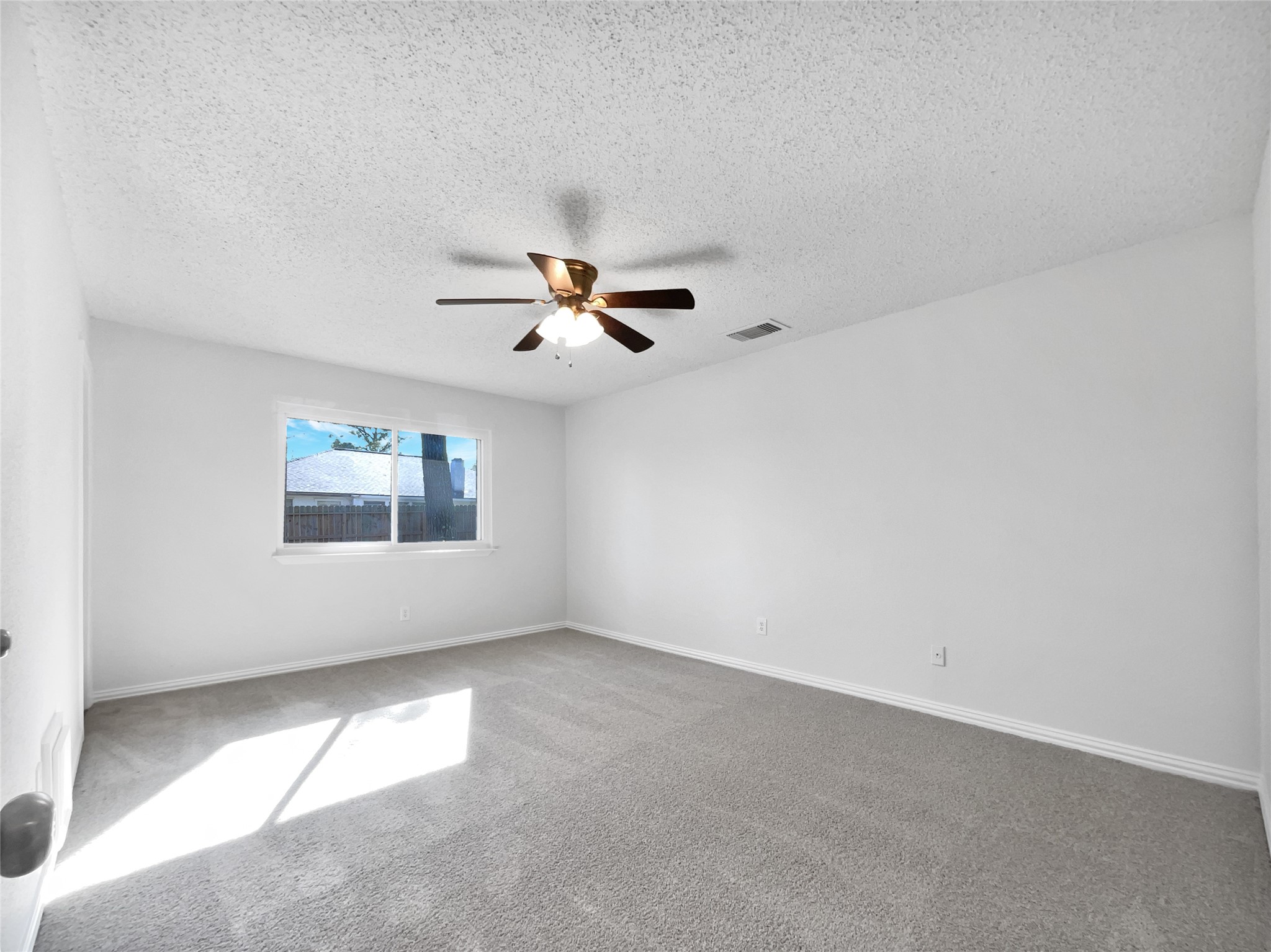 5414 Honeybear Lane Spring, TX 77373 - Photo 14 of 16 a view of a big room with carpet