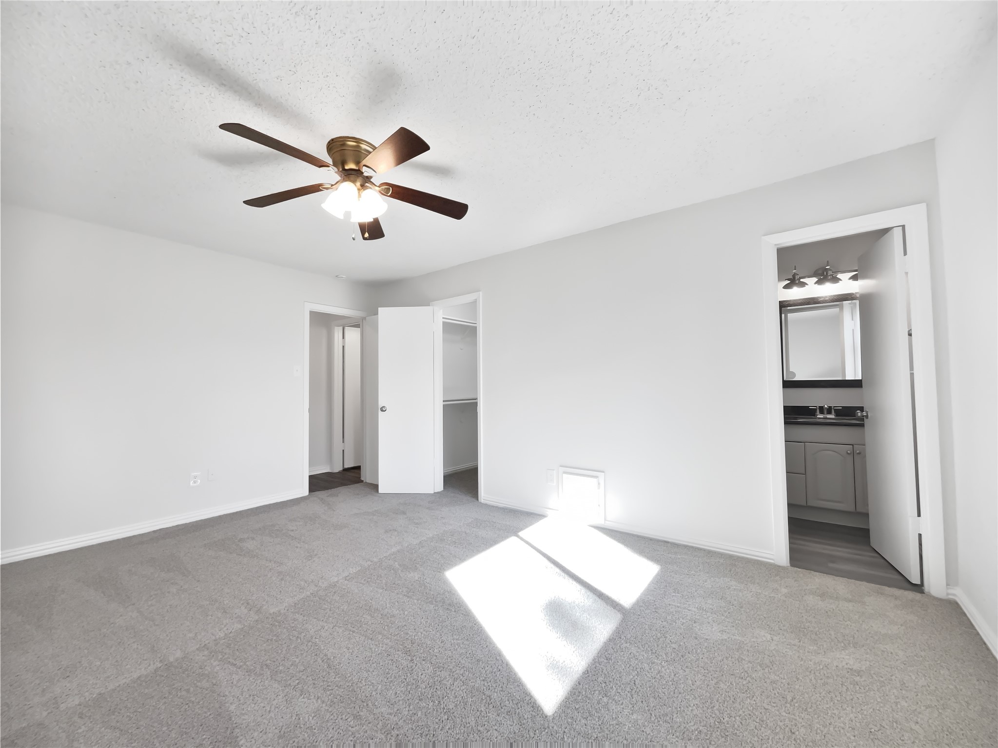 5414 Honeybear Lane Spring, TX 77373 - Photo 4 of 16 a view of a room with a ceiling fan and a window