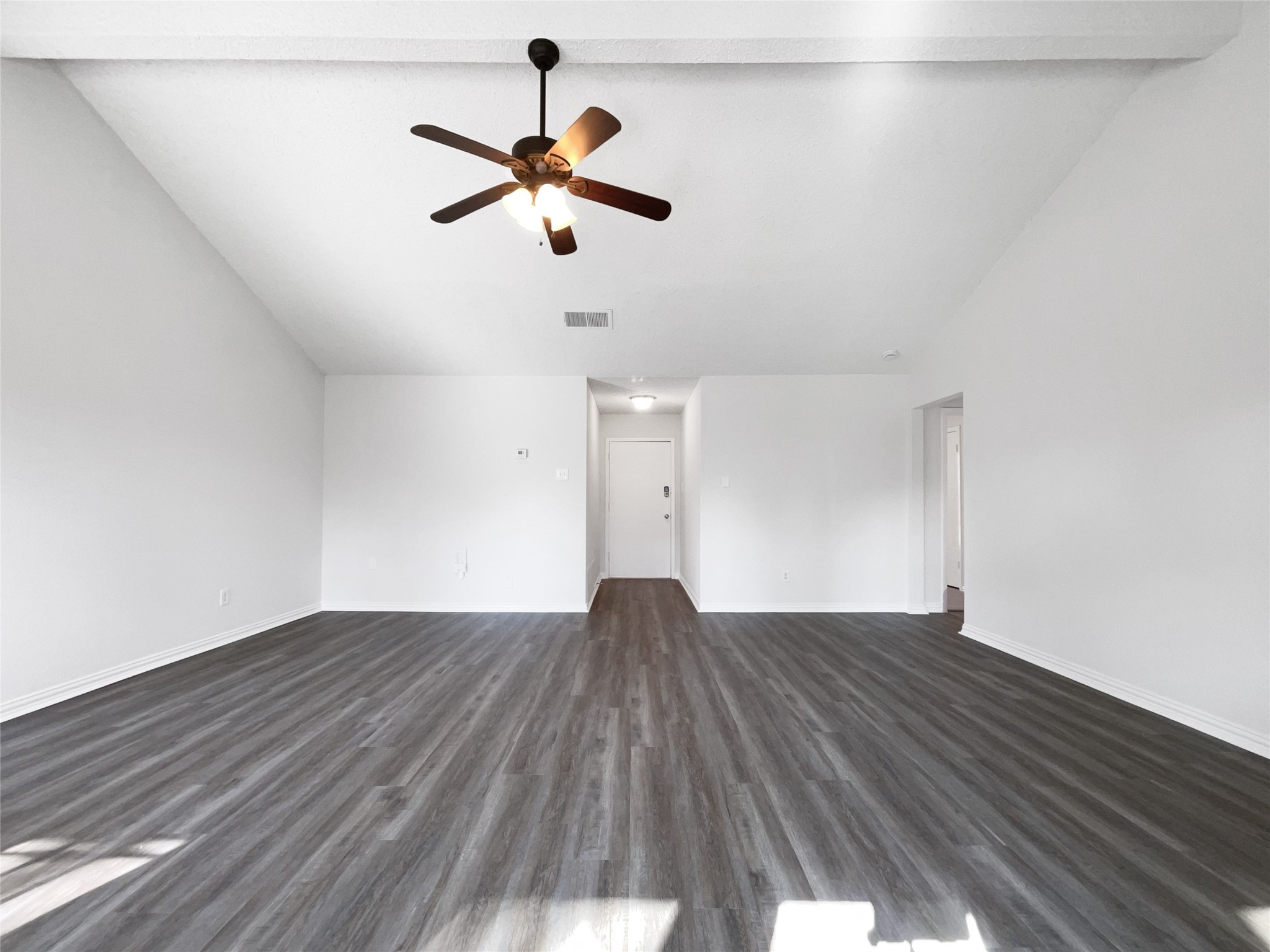 5414 Honeybear Lane Spring, TX 77373 - Photo 6 of 16 a view of empty room with wooden floor and fan