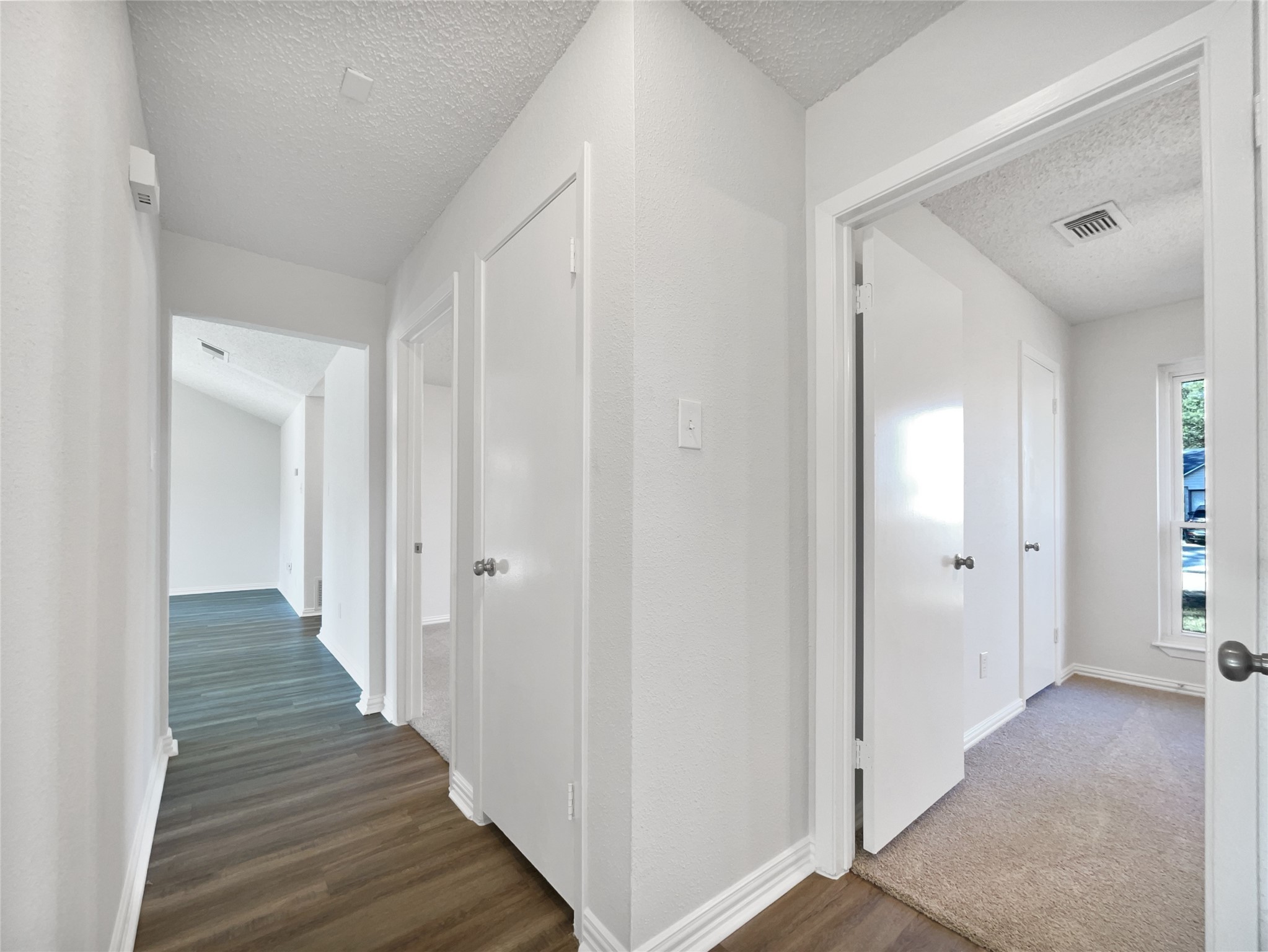 5414 Honeybear Lane Spring, TX 77373 - Photo 10 of 16 a view of a hallway with wooden floor