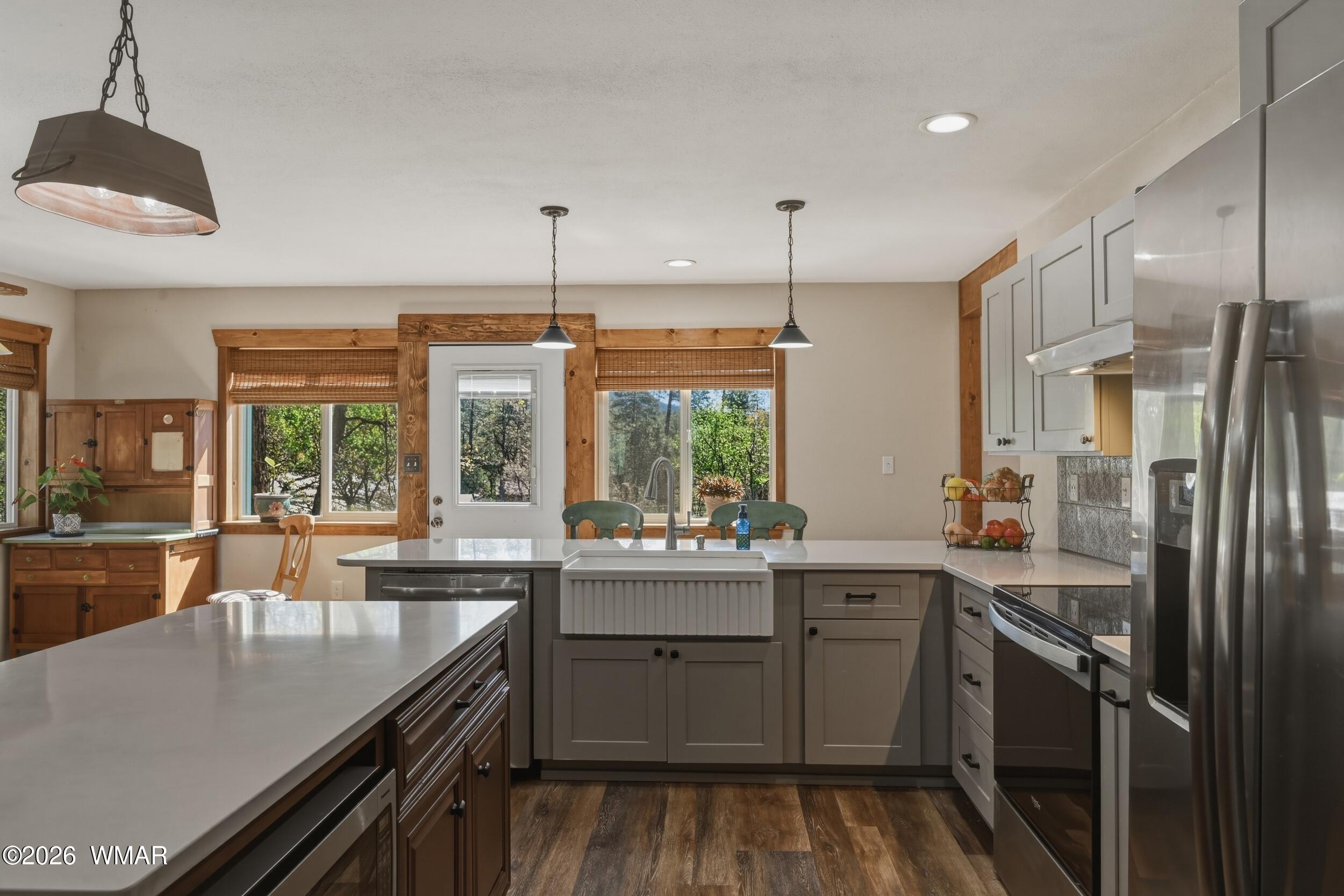 3533 Foothill Road Pine, AZ 85544 - Photo 12 of 52 a kitchen with a sink stove and refrigerator
