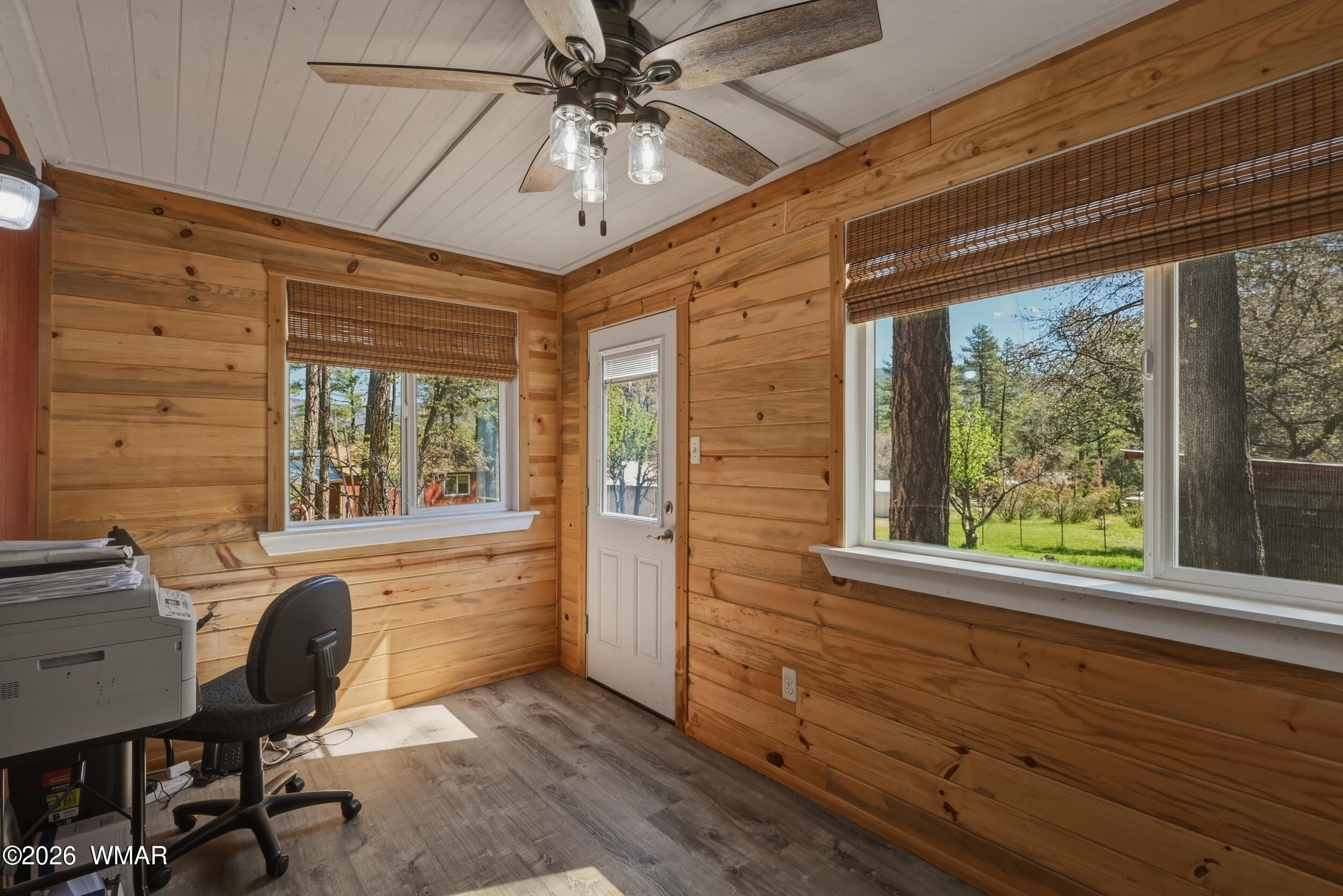 3533 Foothill Road Pine, AZ 85544 - Photo 19 of 52 a workspace with wooden floor and windows
