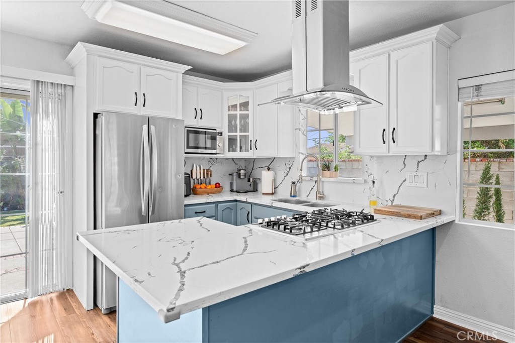 14508 Corlett Avenue Compton, CA 90220 - Photo 16 of 47 a kitchen with stainless steel appliances granite countertop a sink stove and refrigerator