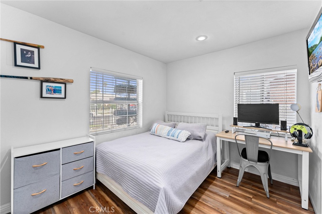 14508 Corlett Avenue Compton, CA 90220 - Photo 21 of 47 a bedroom with a bed and a computer on the desk
