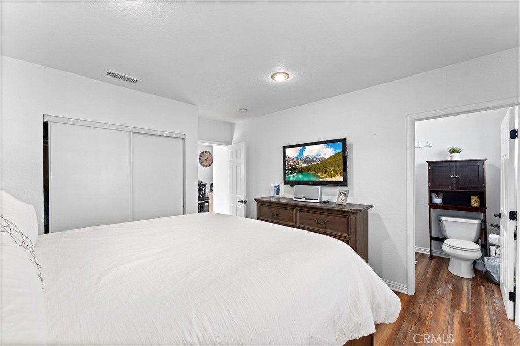 14508 Corlett Avenue Compton, CA 90220 - Photo 28 of 47 a bedroom with a bed and a flat screen tv