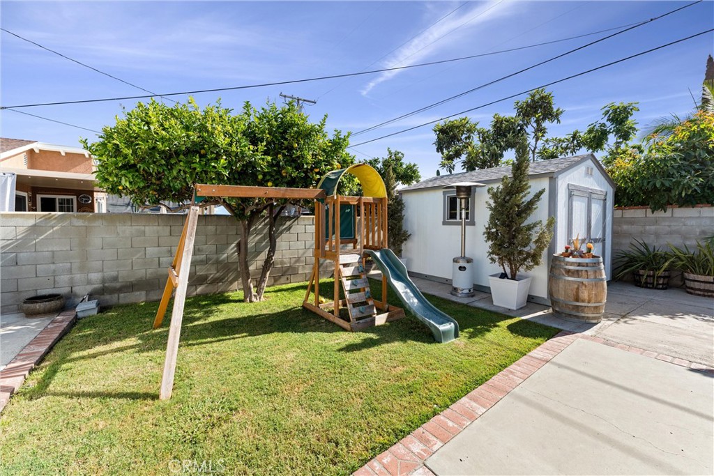 14508 Corlett Avenue Compton, CA 90220 - Photo 34 of 47 a view of a house with a backyard