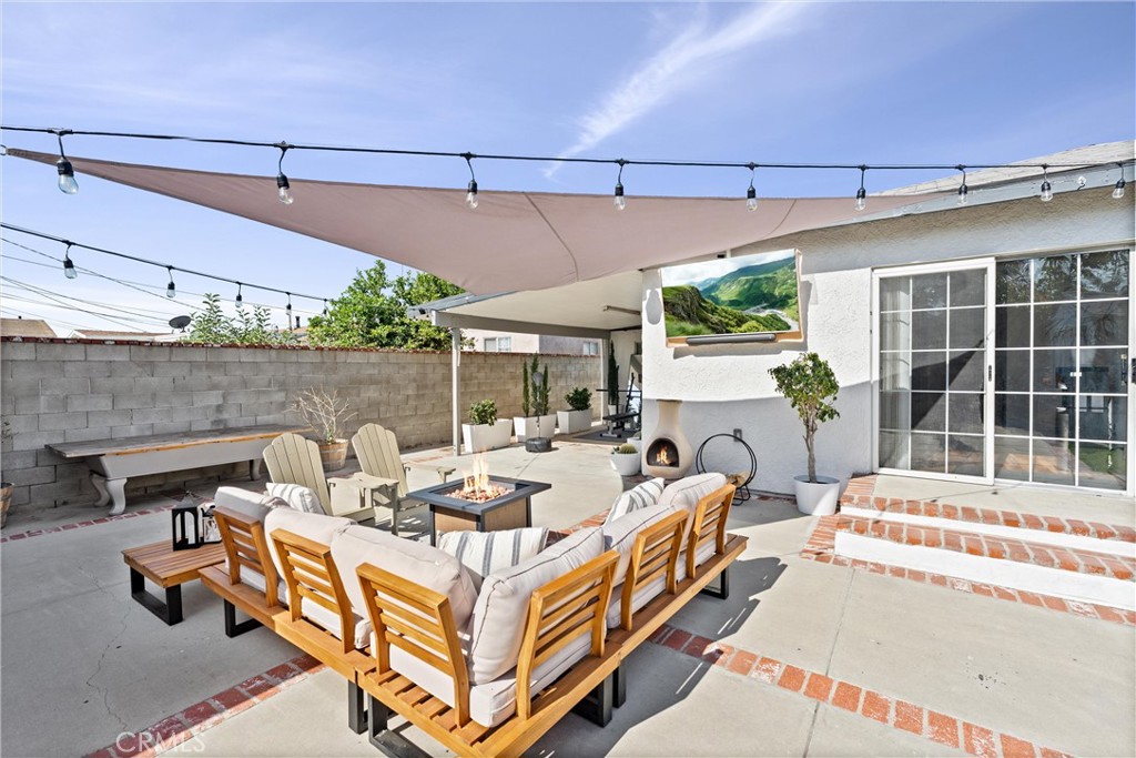 14508 Corlett Avenue Compton, CA 90220 - Photo 36 of 47 a view of a patio with couches and potted plants