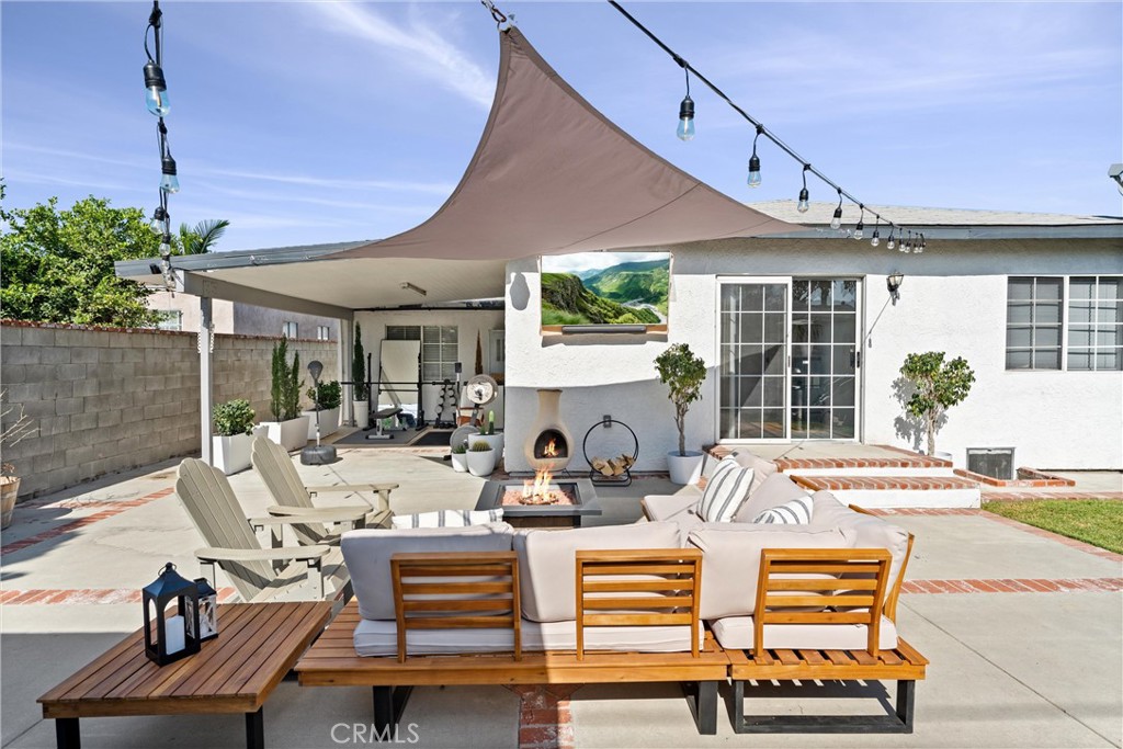 14508 Corlett Avenue Compton, CA 90220 - Photo 37 of 47 a view of a house with swimming pool and furniture