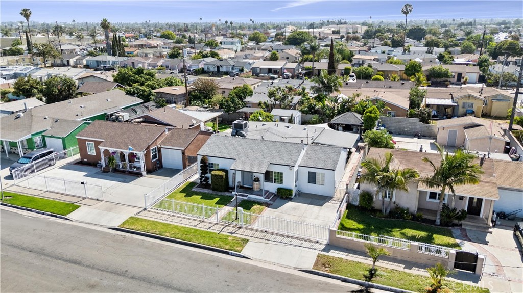 14508 Corlett Avenue Compton, CA 90220 - Photo 4 of 47 an aerial view of multiple houses with yard