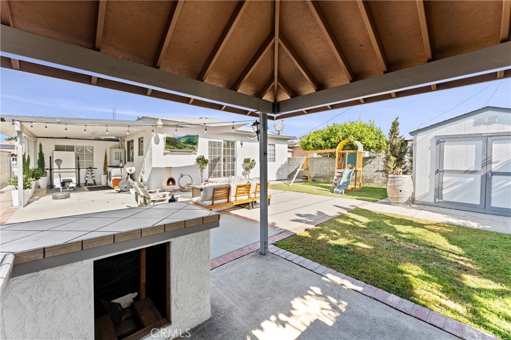 14508 Corlett Avenue Compton, CA 90220 - Photo 43 of 47 a view of a swimming pool with a outdoor seating