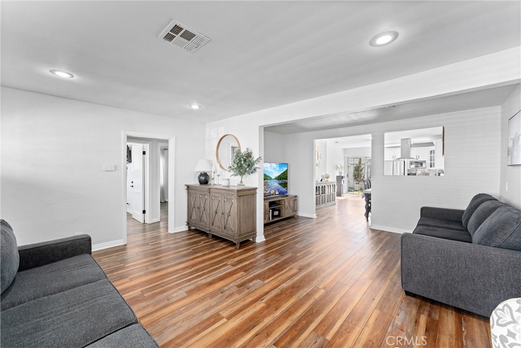 14508 Corlett Avenue Compton, CA 90220 - Photo 9 of 47 a living room with furniture and wooden floor