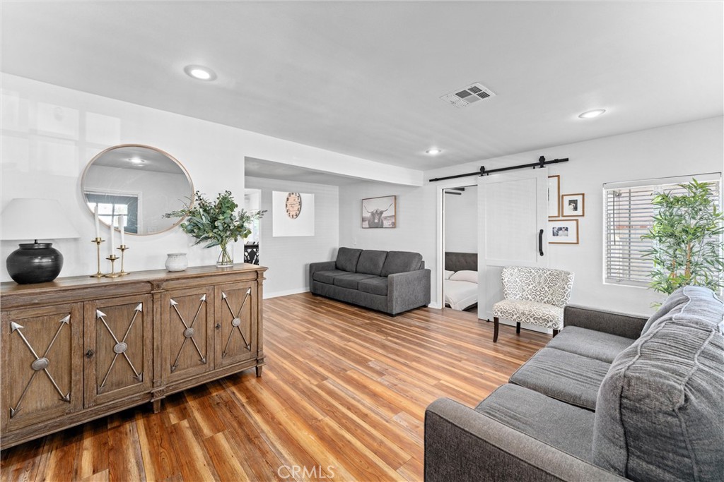14508 Corlett Avenue Compton, CA 90220 - Photo 10 of 47 a living room with furniture and a large window