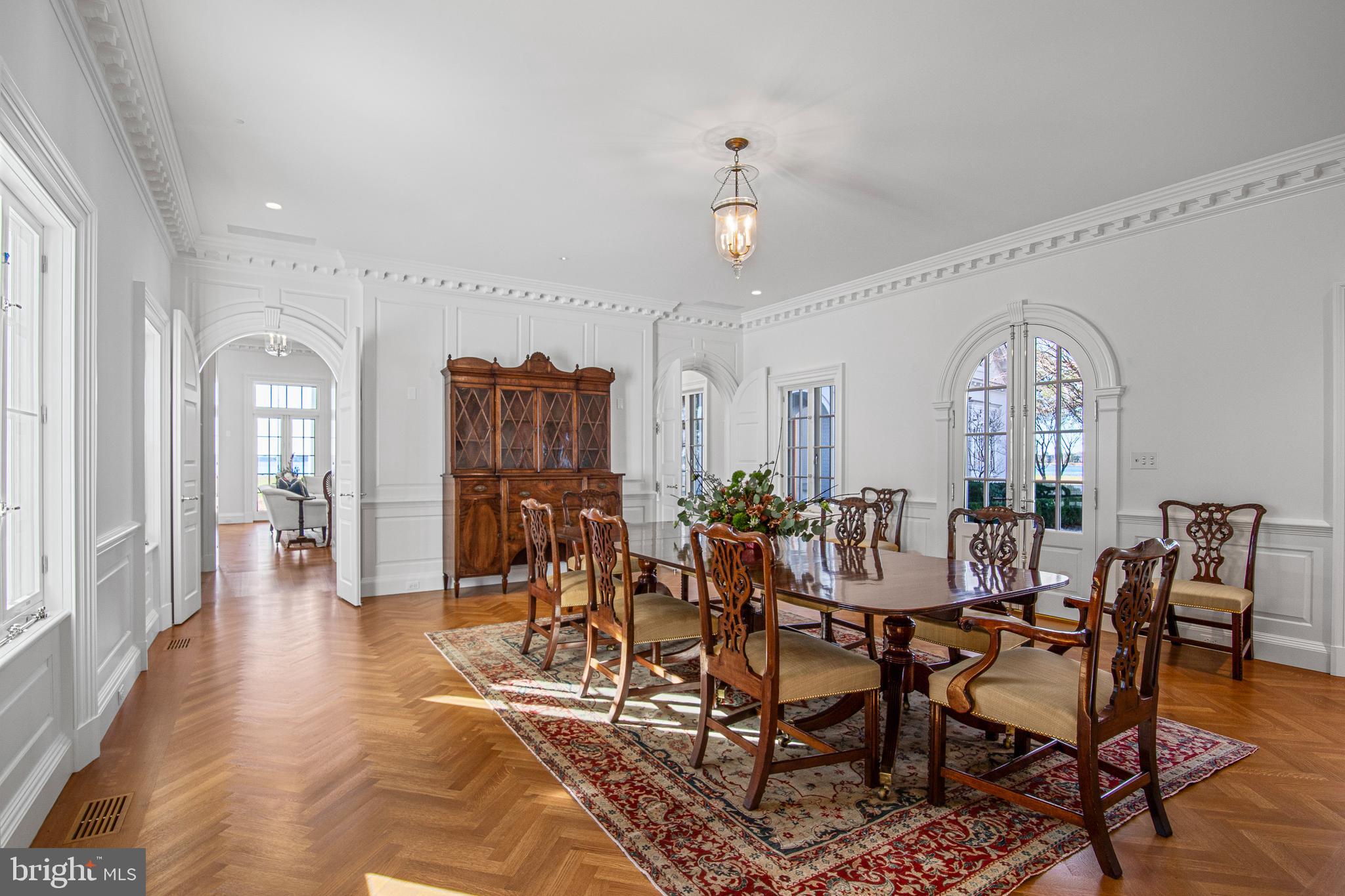 6010 Shipyard Lane Easton, MD 21601 - Photo 18 of 71 a view of a dining room with furniture window and wooden floor